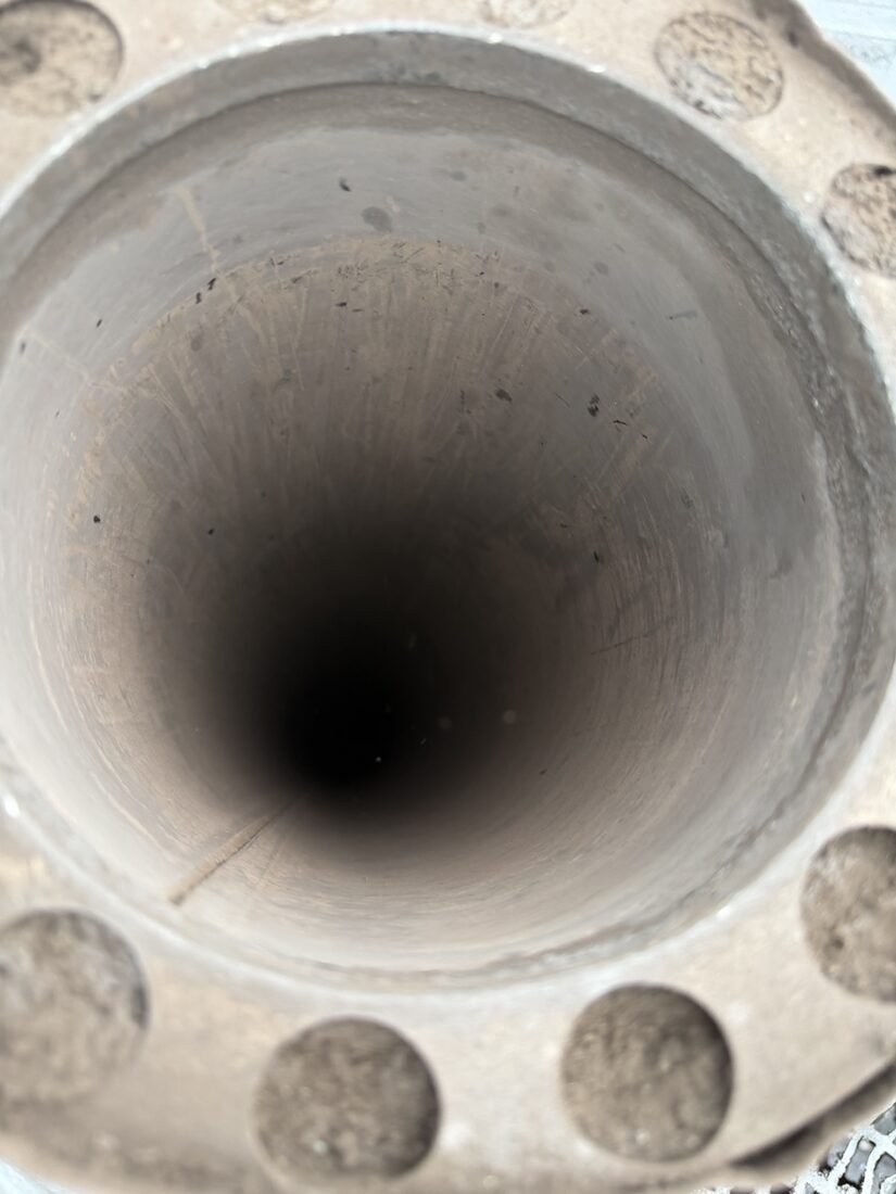 The same chimney flue clean after sweeping