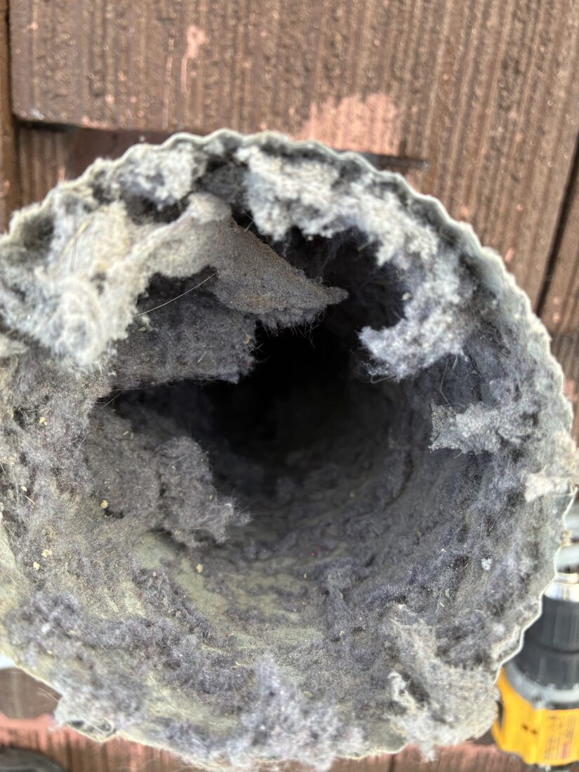 Dryer vent packed solid with lint before cleaning